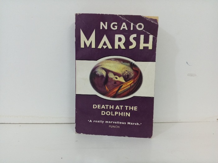 DEATH AT THE DOLPHIN